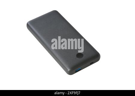 Schwarze Powerbank mit usb-Anschluss und usb-C-Anschluss auf weißem Hintergrund Stockfoto