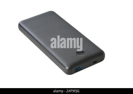 Schwarze Powerbank mit usb-Anschluss und usb-C-Anschluss auf weißem Hintergrund Stockfoto