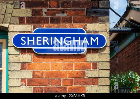 Sheringham Railway Station Schild an der Mauer am Bahnhof - Teil der North Norfolk Railway's Poppy Line Stockfoto