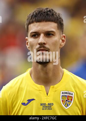 MÜNCHEN - Dennis man of Romania beim Achtelfinale der UEFA EURO 2024 zwischen Rumänien und den Niederlanden am 2. Juli 2024 in München. ANP MAURICE VAN STEEN niederlande raus - belgien raus Stockfoto