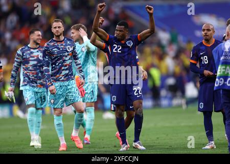 München, Deutschland. Juli 2024. Denzel Dumfries aus den Niederlanden feiert das Achtelfinale der UEFA Euro 2024 zwischen Rumänien und Nederland am 2. Juli 2024 in München. Quelle: Marco Canoniero/Alamy Live News Stockfoto