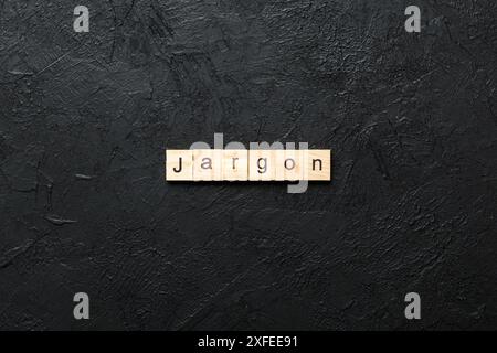 Jargon Wort auf Holzblock geschrieben. Jargon Text auf Zementtabelle für Ihr Design, Draufsicht Konzept. Stockfoto