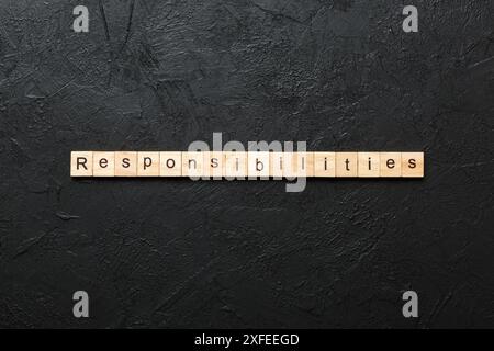 Verantwortungswort auf Holzblock geschrieben. Verantwortungstext auf Tisch, Konzept. Stockfoto