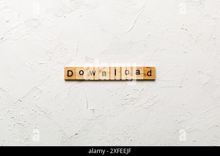 Download Word auf Holz Block geschrieben. Download Text auf Tisch, Konzept. Stockfoto