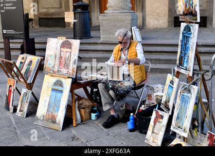 Italienischer Straßenkünstler, der auf den Straßen von Florenz in Italien arbeitet Stockfoto