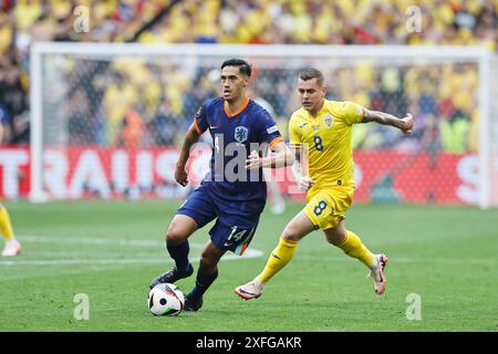 München, Deutschland. Juli 2024. Tijjani Reijnders (NED) Fußball/Fußball : UEFA-Europameisterschaft Deutschland 2024 - Achtelfinale zwischen Rumänien 0-3 Niederlande in der Münchner Fußballarena in München. Quelle: Mutsu Kawamori/AFLO/Alamy Live News Stockfoto
