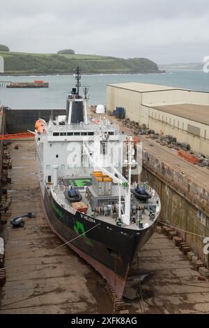 Extreme E, elektrisch betriebene Geländerennen-Meisterschaften, Stützschiff, Ex RMS, St. Helena, im Trockendock, das repariert wird. Falmouth Docks, A&P Ltd, Queen Eli Stockfoto