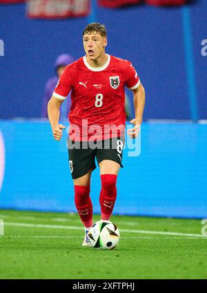Alexander Prass, AUT 8 im Best of 16 Spiel ÖSTERREICH - TÜRKIJE 1-2 der UEFA-Europameisterschaften 2024 am 02. Juli 2024 in Leipzig. Fotograf: Peter Schatz Stockfoto
