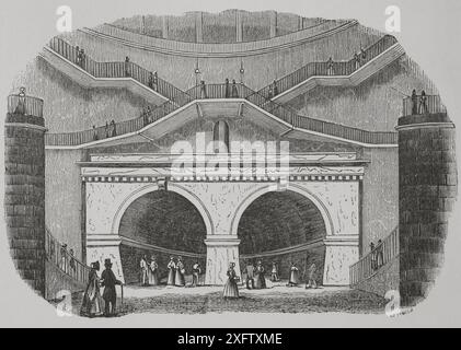 London, England. Thementunnel. Die Galerie überquert die Themse und verbindet die Stadtteile Rotherhithe und Wapping. Sie wurde zwischen 1825 und 1843 von Marc Brunel (1769–1849) und seinem Sohn Isambard Kingdom Brunel (1806–1859) erbaut. Eröffnung am 25. März 1843. Eingang Wapping. Kupferstich von Cabanach. „Los Héroes y las Grandezas de la Tierra“ (die Helden und die Grandeure der Erde). Band VIII. 1856. Stockfoto