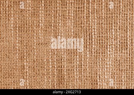 Orangefarbener Polsterung aus Jacquard-Gewebe mit grober Webstruktur. Textilhintergrund, Möbel Textilmaterial, Tapete, Hintergrund. Stoffstruktur CLOO Stockfoto