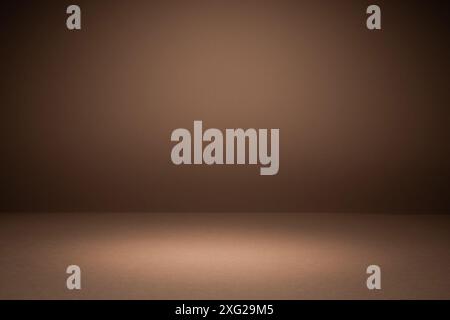 Brauner Gradient Studio-Hintergrund Mit Licht Stockfoto