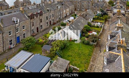 Footdee oder Fittie Aberdeen ein altes Fischerdorf am Ende des Hafens von Aberdeen, kleine Gärten und Rasenflächen Stockfoto