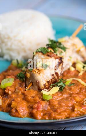 Chickencurry mit Basmatireis Stockfoto