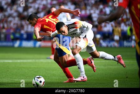 Fussball, Europameisterschaft, EURO 2024, Viertelfinale, MHP-Arena Stuttgart: Spanien Deutschland; Jamal Musiala (DE), Rodri (SPA). Aktion Stockfoto