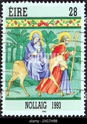 IRLAND - UM 1993: Ein in Irland gedruckter Stempel aus der "Weihnachtsausgabe" zeigt den Flug nach Ägypten Stockfoto