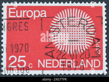 Gestempelte Briefmarke gedruckt von den Niederlanden, Europa CEPT-Briefmarke - Flaming Sun', um 1970. Stockfoto