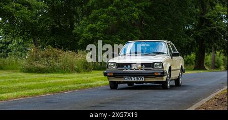 East Lothian, Schottland, Großbritannien, 7. Juli 2024. Räder der Vergangenheit: Die schottische Vereinigung der Fahrzeugliebhaber führt die Besitzer von Oldtimern durch die Landschaft zum malerischen Gelände von Lennoxlove. Im Bild: Ein Triumph von 1988. Quelle: Sally Anderson/Alamy Live News Stockfoto