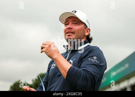 07. Juli 2024, Bayern, München/Eichenried: Golf: BMW International Open, Runde 4, Schottlands Ewen Ferguson reagiert auf seinen Sieg. Foto: Ulrich Gamel/kolbert-Press/dpa Stockfoto