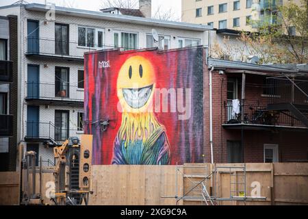 Mona Grin Wandgemälde in der Saint-Dominique Street im Zentrum von Montreal, Quebec, Kanada Stockfoto