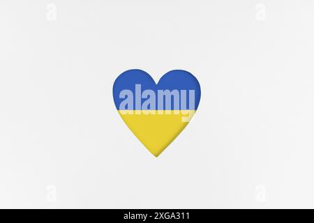 Ukraine Flagge auf Herz-Form isoliert auf weißem Karton Hintergrund. Bedruckter Karton mit gestanzter Herzform. Draufsicht Stockfoto