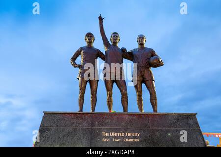 The United Trinity, George Best, Denis Law, Bobby Charlton, Old Trafford, Statue, Manchester United, Greater Manchester, England, Vereinigtes Königreich, Euro Stockfoto