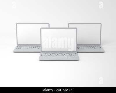 Drei schlanke, unbeschriftete Laptops auf weißem Hintergrund mit leeren Bildschirmen schaffen eine minimalistische und moderne Atmosphäre Stockfoto