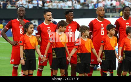 L R Kanadas Mittelfeldspieler Ismael Kone, Mittelfeldspieler Stephen Eustaquio, Stürmer Jonathan David und Verteidiger Derek Cornelius stehen vor dem Halbfinalspiel der Copa AmÃ rica USA 2024 zwischen Argentinien und Kanada im MetLife Stadium in New Jersey am 9. Juli 2024 IN New Jersey, USA Copyright: XALEJANDROxPAGNIx Stockfoto