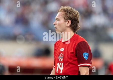 East Rutherford, Usa. Juli 2024. Jacob Shaffelburg (14) aus Kanada im Halbfinale von CONMEBOL Copa America 2024 gegen Argentinien im MetLife Stadium in East Rutherford, NJ Argentinien gewann mit 2:0 und erreichte das Finale. (Foto: Lev Radin/Pacific Press) Credit: Pacific Press Media Production Corp./Alamy Live News Stockfoto
