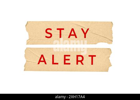 Bleiben Sie wachsam Konzept. Kleben Sie Sticker mit Text isoliert auf weißem Hintergrund Stockfoto