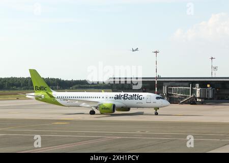 Riga, Lettland - 26. Mai 2024: Air Baltic Aircraft am Flughafen Lidosta. Air Baltic ist die Fluggesellschaft Lettlands Stockfoto