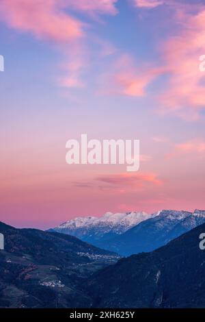 Mountains covered in snow at sunset Stock Photo