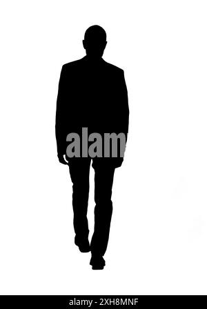 Hintere Silhouette eines Mannes, der in einem Anzug läuft Stockfoto