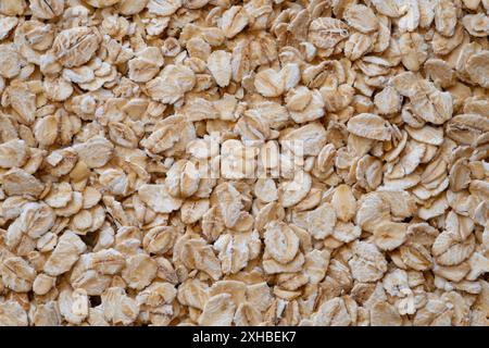 Haferflockenstruktur. Haferflocken natürliche Textur oder Hintergrund, Nahaufnahme, hohe Auflösung. Stockfoto