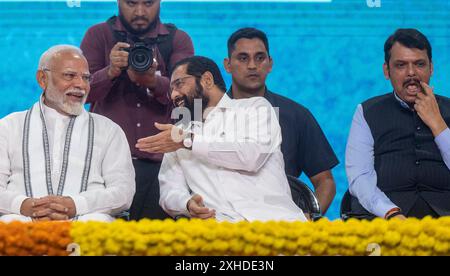 Mumbai, Indien. Juli 2024. MUMBAI, INDIEN - 13. JULI: Premierminister Narendra Modi startet Infrastrukturprojekte im Wert von 29.400 Mrd. RS bei einer Veranstaltung in Goregaon, am 13. Juli 2024 in Mumbai, Indien. Modi sagte, dass laut RBI-Bericht in den letzten drei bis vier Jahren acht Milliarden neue Arbeitsplätze im Land geschaffen wurden. Modi sprach bei einer Veranstaltung im Stadtteil Goregaon von Mumbai, nachdem er den Grundstein für RS 29.000-Milliarden-Projekte im Straßen-, Schienen- und Hafensektor in der Stadt gelegt hatte. (Foto: Satish Bate/Hindustan Times/SIPA USA) Credit: SIPA USA/Alamy Live News Stockfoto