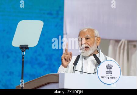 Mumbai, Indien. Juli 2024. MUMBAI, INDIEN - 13. JULI: Premierminister Narendra Modi startet Infrastrukturprojekte im Wert von 29.400 Mrd. RS bei einer Veranstaltung in Goregaon, am 13. Juli 2024 in Mumbai, Indien. Modi sagte, dass laut RBI-Bericht in den letzten drei bis vier Jahren acht Milliarden neue Arbeitsplätze im Land geschaffen wurden. Modi sprach bei einer Veranstaltung im Stadtteil Goregaon von Mumbai, nachdem er den Grundstein für RS 29.000-Milliarden-Projekte im Straßen-, Schienen- und Hafensektor in der Stadt gelegt hatte. (Foto: Satish Bate/Hindustan Times/SIPA USA) Credit: SIPA USA/Alamy Live News Stockfoto