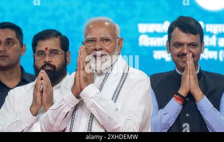 Mumbai, Indien. Juli 2024. MUMBAI, INDIEN - 13. JULI: Premierminister Narendra Modi startet Infrastrukturprojekte im Wert von 29.400 Mrd. RS bei einer Veranstaltung in Goregaon, am 13. Juli 2024 in Mumbai, Indien. Modi sagte, dass laut RBI-Bericht in den letzten drei bis vier Jahren acht Milliarden neue Arbeitsplätze im Land geschaffen wurden. Modi sprach bei einer Veranstaltung im Stadtteil Goregaon von Mumbai, nachdem er den Grundstein für RS 29.000-Milliarden-Projekte im Straßen-, Schienen- und Hafensektor in der Stadt gelegt hatte. (Foto: Satish Bate/Hindustan Times/SIPA USA) Credit: SIPA USA/Alamy Live News Stockfoto