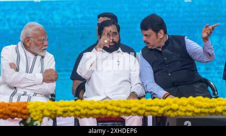 Mumbai, Indien. Juli 2024. MUMBAI, INDIEN - 13. JULI: Premierminister Narendra Modi startet Infrastrukturprojekte im Wert von 29.400 Mrd. RS bei einer Veranstaltung in Goregaon, am 13. Juli 2024 in Mumbai, Indien. Modi sagte, dass laut RBI-Bericht in den letzten drei bis vier Jahren acht Milliarden neue Arbeitsplätze im Land geschaffen wurden. Modi sprach bei einer Veranstaltung im Stadtteil Goregaon von Mumbai, nachdem er den Grundstein für RS 29.000-Milliarden-Projekte im Straßen-, Schienen- und Hafensektor in der Stadt gelegt hatte. (Foto: Satish Bate/Hindustan Times/SIPA USA) Credit: SIPA USA/Alamy Live News Stockfoto