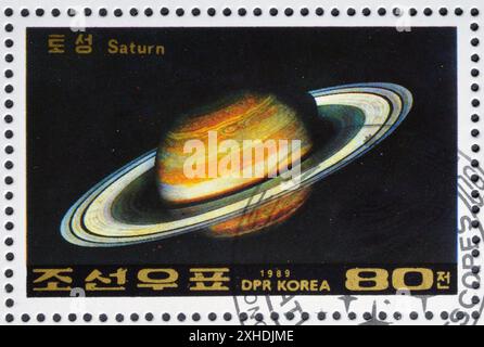 Von Nordkorea gedruckte Briefmarke, die Saturn zeigt, um 1989. Stockfoto