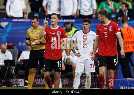 Christoph Baumgartner feiert, nachdem er beim Spiel der UEFA Euro 2024 zwischen den Nationalmannschaften Polens und Österreichs im Olympiastadion in Berlin ein Tor geschossen hat Stockfoto