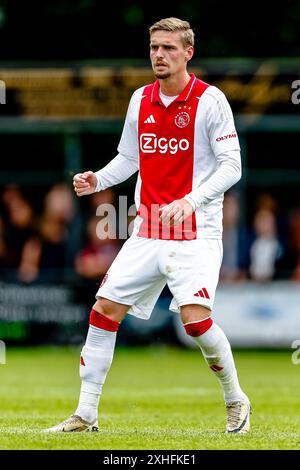 Wezep, Niederlande. Juli 2024. WEZEP, 13-07-2024, Sportpark Mulderssingel, Fußball, Friendly, Saison 2024/2025, während des Spiels Ajax - Rangers FC, Ajax Spieler Kenneth Taylor Credit: Pro Shots/Alamy Live News Stockfoto
