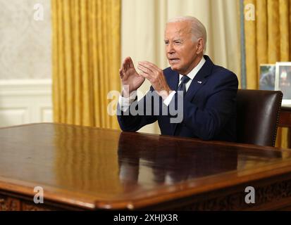 Washington, Usa. Juli 2024. Präsident Joe Biden spricht am Sonntag, den 14. Juli 2024, vom Oval Office des Weißen Hauses in Washington, DC. Er äußerte sich in Bezug auf die Verletzung des ehemaligen Präsidenten Donald Trump während einer Schießerei bei einer Wahlkundgebung am 13. Juli in Pennsylvania. Der Angriff am Samstag tötete einen Zuschauer am Tatort und ließ zwei weitere schwer verletzt werden. Pool Foto von Erin Schaff/UPI Credit: UPI/Alamy Live News Stockfoto