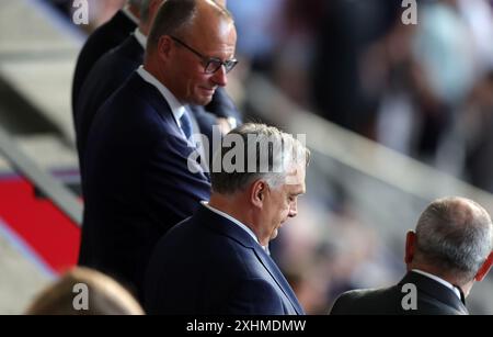 BERLIN, DEUTSCHLAND - 14. JULI: Friedrich Merz, Vorsitzender der CDU-Partei mit Viktor Orban, ungarischem Premierminister, während des Endspiels der UEFA EURO 2024 zwischen Spanien und England am 14. Juli 2024 im Olympiastadion in Berlin. © diebilderwelt / Alamy Stock Stockfoto