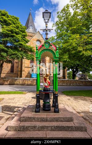 Der Cherub-Brunnen vor der Kathedrale von Dornoch, Dornoch, Caithness, Schottland Stockfoto