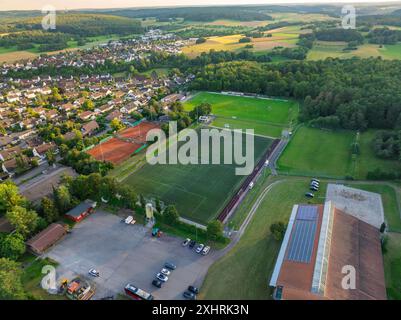 Aerial view of a village with a large sports field, football pitches and tennis courts, Gechingen, Black Forest, Germany Stockfoto