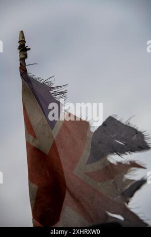 Gebeutelter gewerkschaftsjäger oder britische Flagge Stockfoto