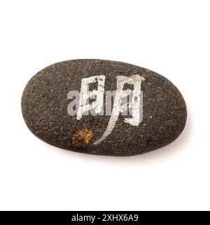 Bedeutung, Übersetzung, chinesisch, japanisch, Zeichen, Pinselstrich, Hub, fließend, flüssig, dynamisch, Gold, Metall, Metall, Kieselstein, Meer, Stein, Rock, sho Stockfoto