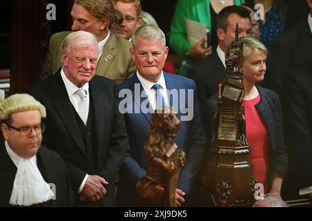 Mitglieder des House of Commons, darunter der Vater des House Sir Edward Leigh, Stuart Andrew und die Innenministerin Yvette Cooper, hören die Rede des Königs während der Parlamentseröffnung in der Kammer des House of Lords im Palace of Westminster, London. Bilddatum: Mittwoch, 17. Juli 2024. Stockfoto