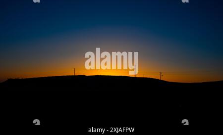 Sonnenuntergang über der Negev-Wüste, fotografiert am Havarim-Fluss (nahe Kibbutz Sde Boker), Israel Stockfoto