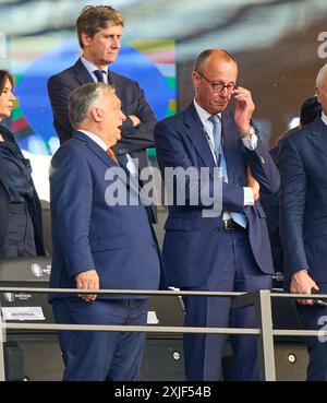 Berlin, Deutschland. Juli 2024. Viktor ORBAN (L), ungarischer Präsident, ungarischer Premierminister, Friedrich Merz (CDU), Bundestagsabgeordneter im Endspiel SPANIEN - ENGLAND 2-1 der UEFA-Europameisterschaften 2024 am 14. Juli 2024 in Berlin. Fotograf: ddp Images/STAR-Images Credit: ddp Media GmbH/Alamy Live News Stockfoto