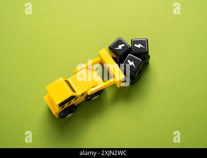 Ein Bulldozer transportiert schwarze Blöcke, die Bedrohungen und Misserfolge symbolisieren. Schwerpunkt auf Strategien zur Risikominderung und -Sanierung. Stockfoto